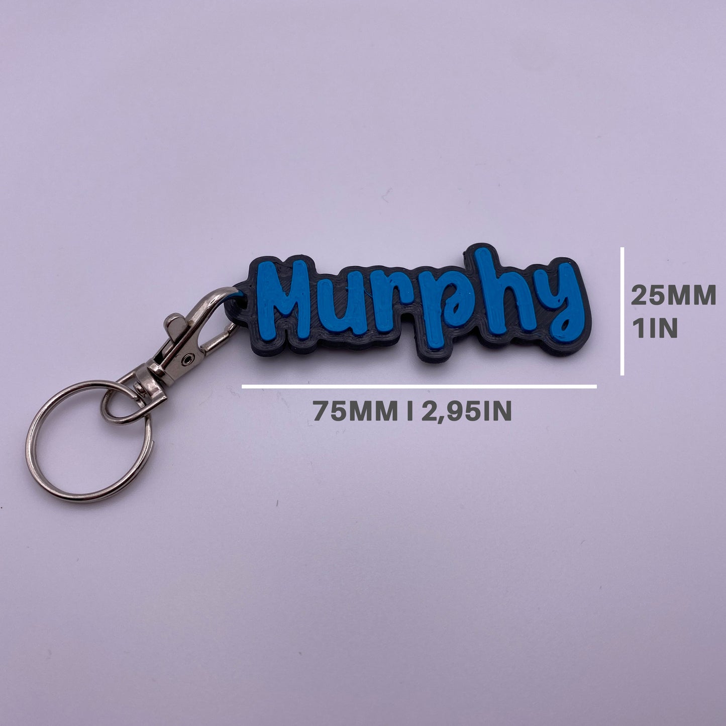 <tc>Customizable keychain made of flexible material I 3D printing</tc>