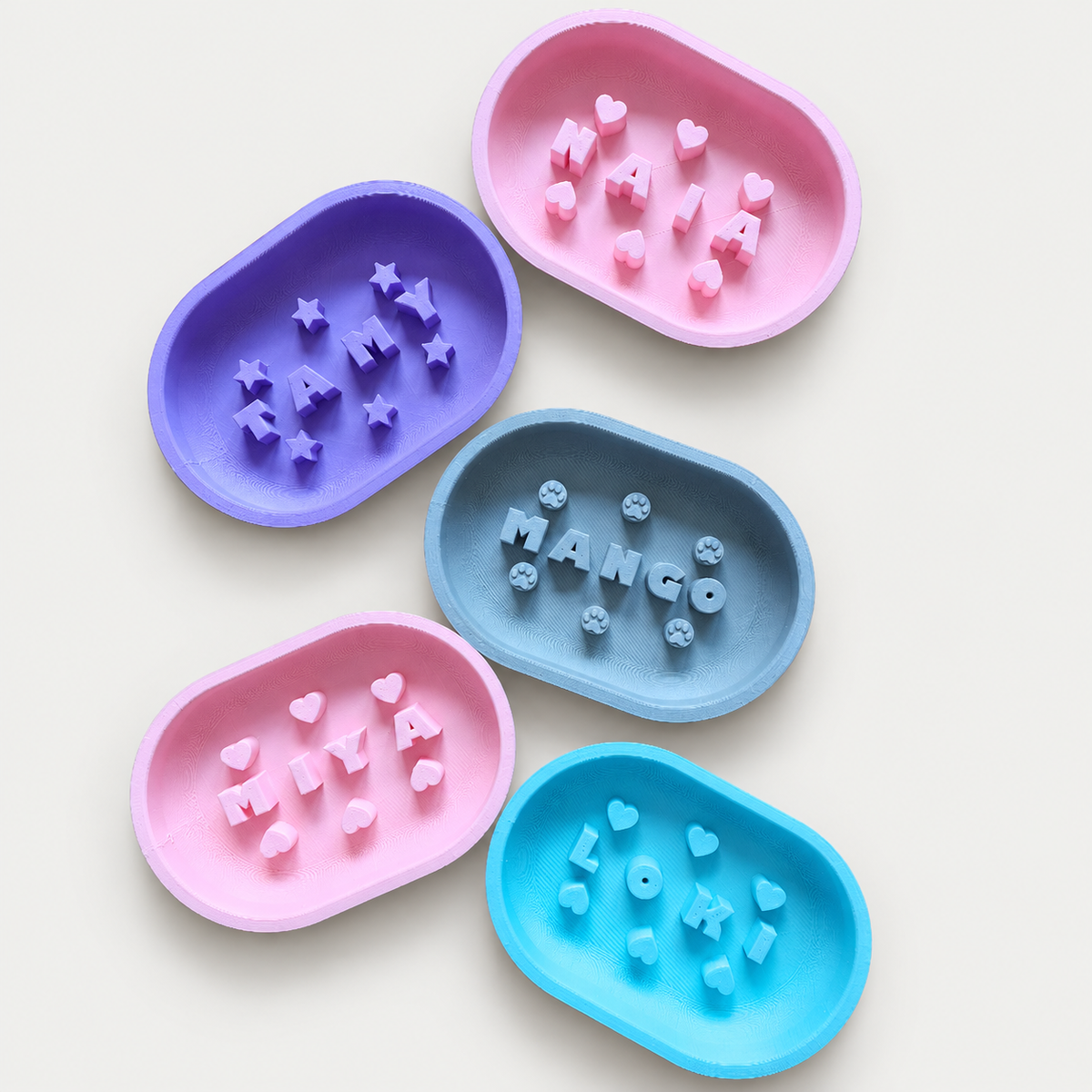 Fünf personalisierte Slowfeeder: TAMY, MAIA, MANGO, MIYA und LOKI