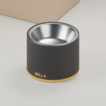 3D rendering: SAUM bowl holder with diamonds, 90 mm high, black with yellow trim and the name BELLA, with an illustrative stainless steel insert.